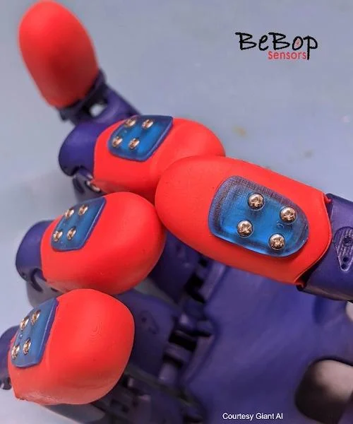 Five RoboSkin sensors with accompanying finger segments to simulate a human hand.