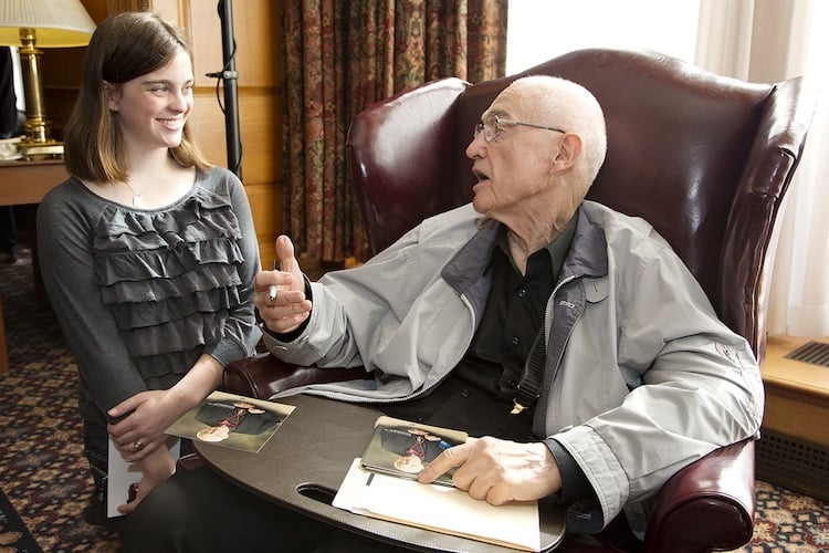 Nick Hollonyak Jr. in his mentorship role talks to a University of Illinois student on the occasion of the 50th anniversary of the LED in 2012.