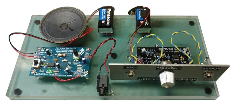 Metronome and Low Pass Filter shown here mounted on plexiglass for a demo.