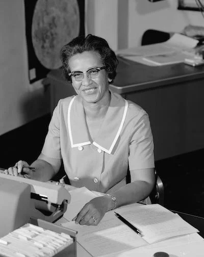 Katherine Johnson at her desk while working at NASA.