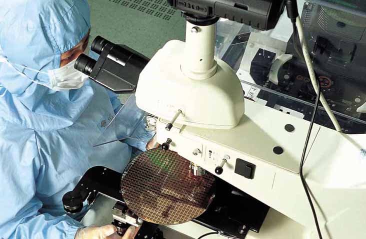 TSMC employee in a clean room