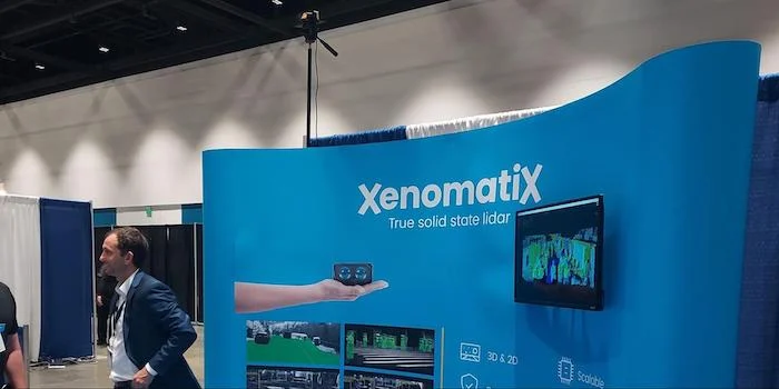 The XenomatiX LiDAR mounted above the booth provides a real-time point cloud of the Sensors Converge conference.